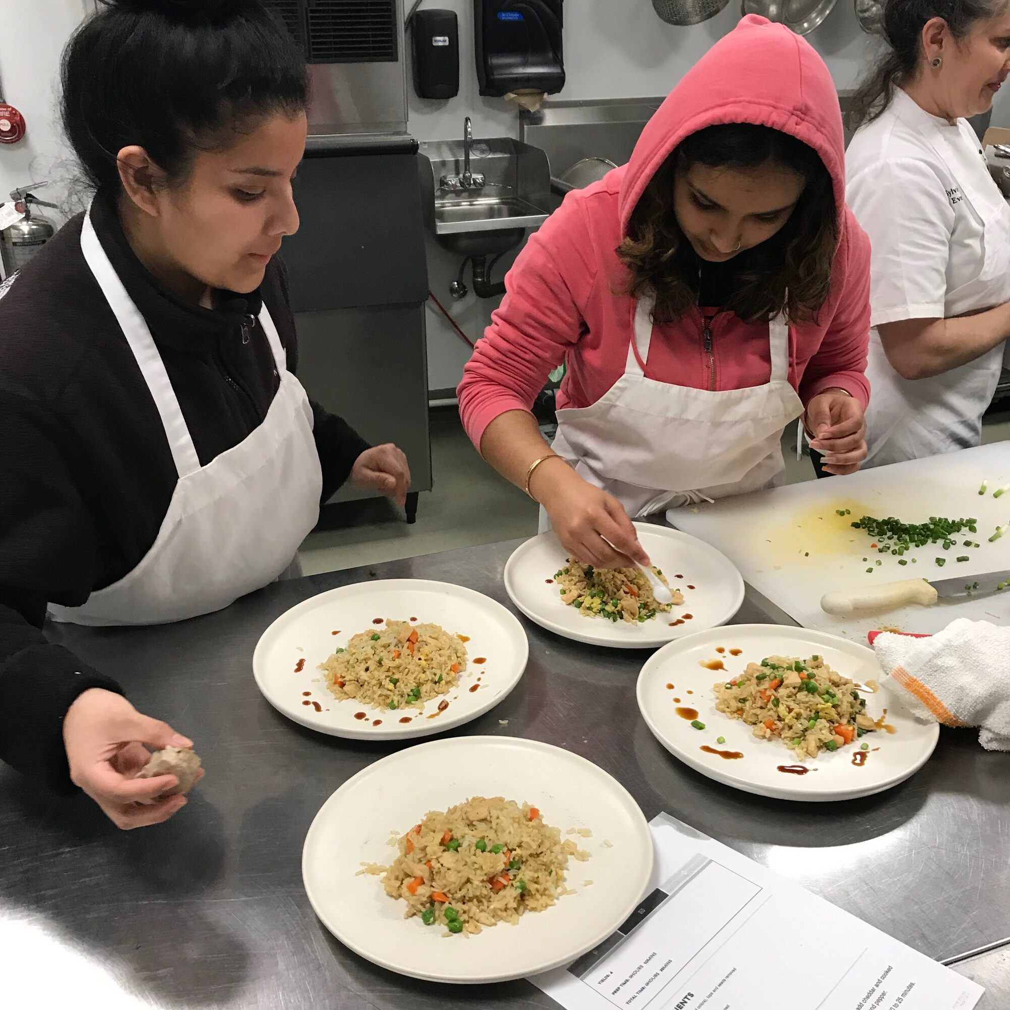 Plant to plate interns in the kitchen